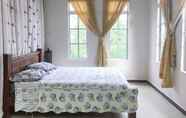 Bedroom 4 Kapal Terbang Guest House