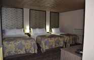 Bedroom 4 AArya Hotel By Niagara Fashion Outlets