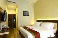 Bedroom The Gambir Anom Hotel Resort & Convention