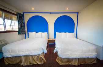 Bedroom 4 Budget Inn Motel