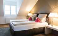 ห้องนอน 4 Helvetia Suites
