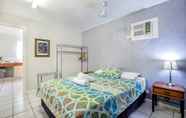 Kamar Tidur 7 Bush Village Holiday Cabins