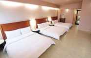 Kamar Tidur 4 Kindness Hotel Weiwuying