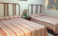 Kamar Tidur 4 Carey House Hotel