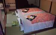 Bedroom 2 Guesthouse Tomari-ya Caters to Women