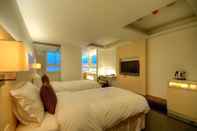 ห้องนอน Kapok Hotel & Resorts