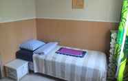 Kamar Tidur 4 Guest House Ugrin Paikka