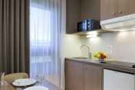 ห้องนอน Nehô Suites Porte de Genève