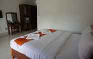 Kamar Tidur 4 The Grand Riverside Hotel