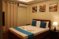 Bedroom Aqua Travel Lodge