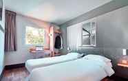 Bedroom 2 B&B Hotel Le Havre Harfleur -1