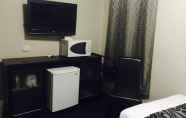 Kamar Tidur 5 City Square Motel