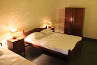 Kamar Tidur Eagles Wings Guest House