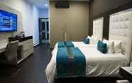 Phòng ngủ 4 Punta Diamante Premium Hotel