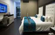 Phòng ngủ 4 Punta Diamante Premium Hotel