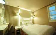 Bilik Tidur 3 Kindness Hotel ZhongShan Bade