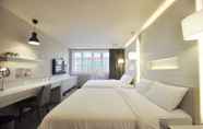 Bedroom 4 Kindness Hotel ZhongShan Bade