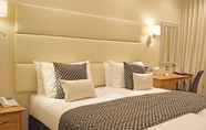 Kamar Tidur 4 The Devon Hotel