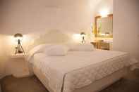 Phòng ngủ Fanari Vista Suites
