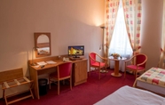 Phòng ngủ 4 Hotel Česká Koruna