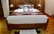 Kamar Tidur 4 Golden Butterfly Hotel