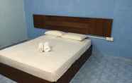 Kamar Tidur 5 Desa Motel