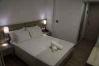 ห้องนอน Piraeus Port Hotel