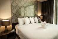 Bedroom Arcadia Residence Ploenchit Bangkok by Compass Hospitality