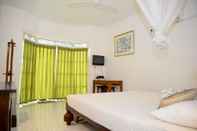 Bedroom Laluna Ayurveda Resort