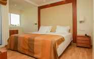 Kamar Tidur 3 Lagoa Hotel