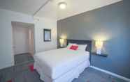 Kamar Tidur 4 Downtowner Boutique Hotel