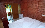 Bedroom 6 Savithri Inn