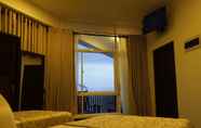 Kamar Tidur 6 Rock Fort Hotel