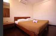 Bedroom 6 Hotel Q Deck Rooms