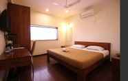 Bedroom 7 Hotel Q Deck Rooms