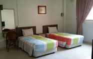 Bilik Tidur 6 Dragon & Phoenix Hotel