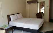 Kamar Tidur 7 Dragon & Phoenix Hotel