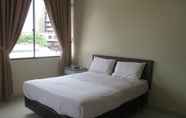 Kamar Tidur 5 Dragon & Phoenix Hotel