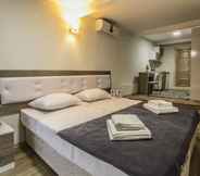 Kamar Tidur 2 Luce Suite Hotel