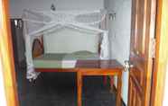 Kamar Tidur 7 Beach Lagoon Guesthouse