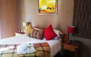 Kamar Tidur 4 Cape Flame Guest House