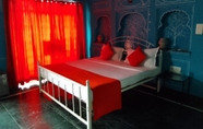 Bedroom 2 The Red Pier by Downtown Udaipur