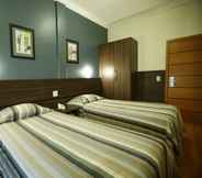 Kamar Tidur 3 Eston Hotel