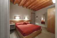 Kamar Tidur Le Scuole - ColleMassari Hospitality