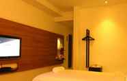 Kamar Tidur 5 The Leverage Business Hotel Mergong