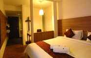 Kamar Tidur 6 The Leverage Business Hotel Mergong