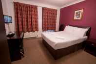 Bedroom Rossmore Hotel