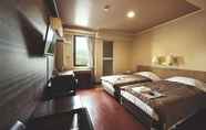 Bedroom 6 Sansui Global Inn