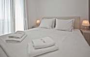 Bedroom 5 White Tinos Luxury Suites