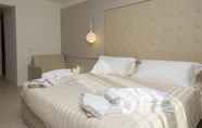 Kamar Tidur 6 White Angel Hotel